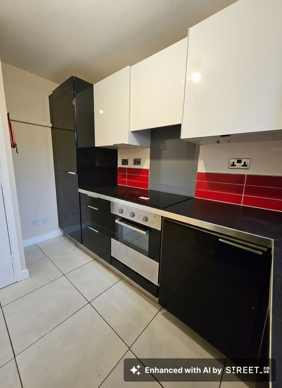 Property photo 3 of 9 Kitchen