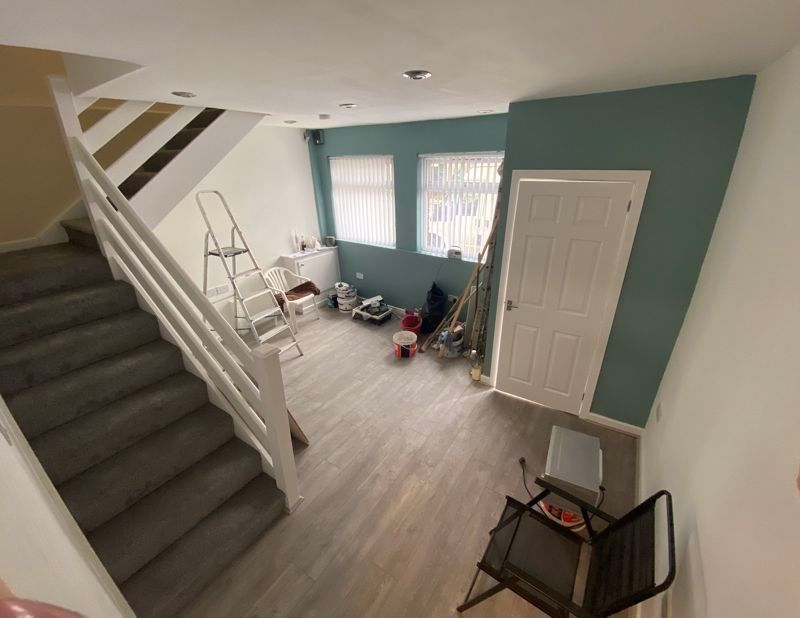 Property photo 2 of 11 Living Area