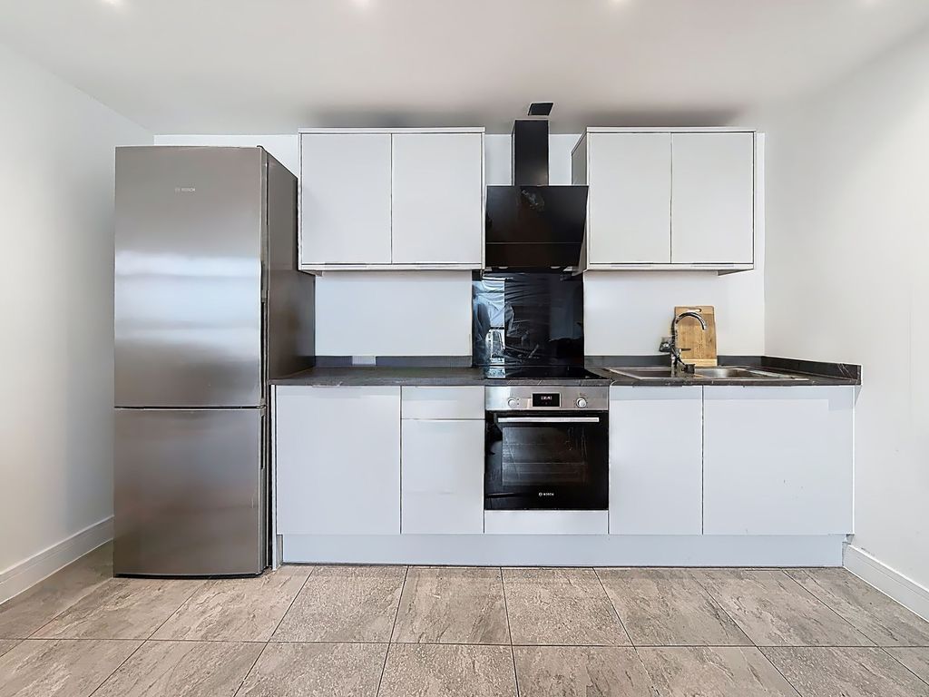 Property photo 1 of 13 Kitchen Area
