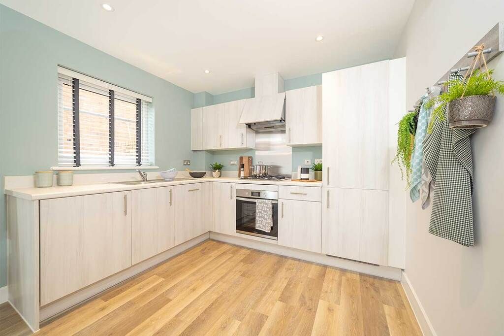 Property photo 3 of 9 Typical Kitchen