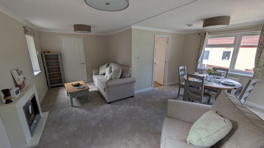 Property photo 3 of 16 32 Omar Regency In Penwortham Living