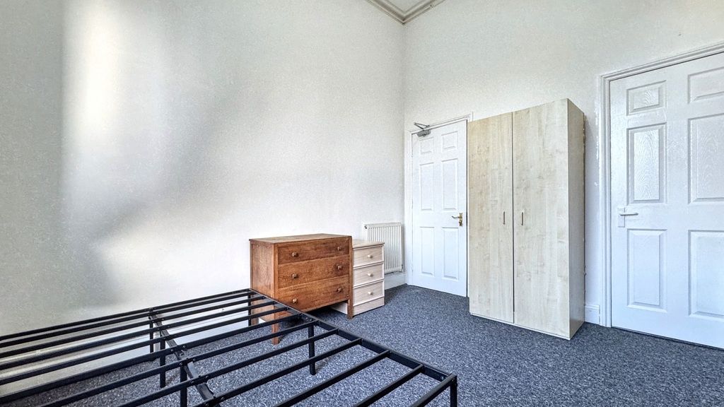 Property photo 3 of 4 Bright, Simply Furnished Bedroom With Neutral Deco...