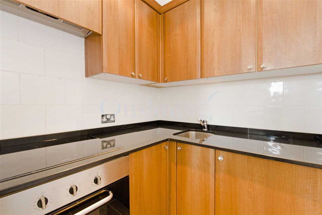 Property photo 3 of 8 Kitchen