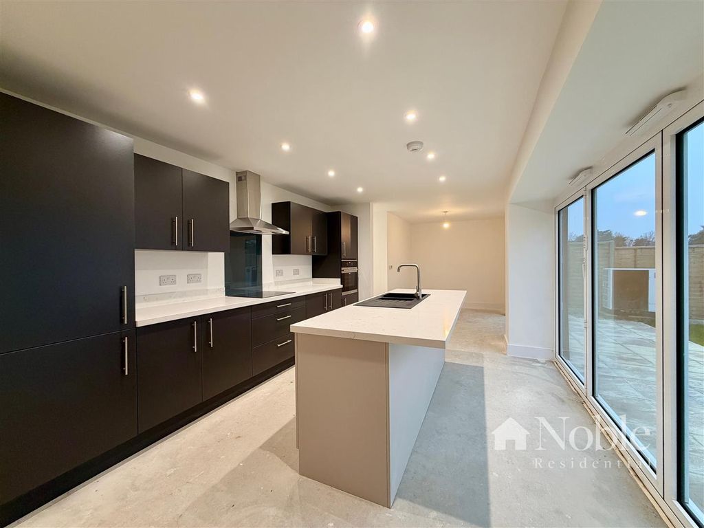 Property photo 2 of 16 Kitchen Area