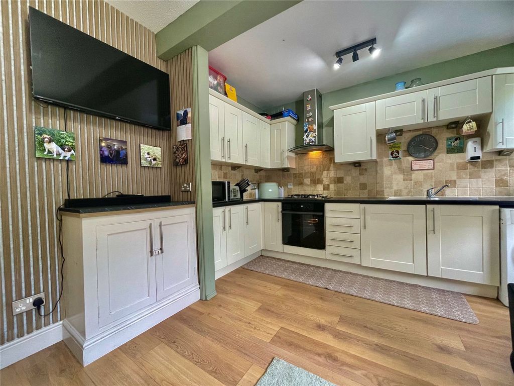 Property photo 3 of 17 Dining Kitchen