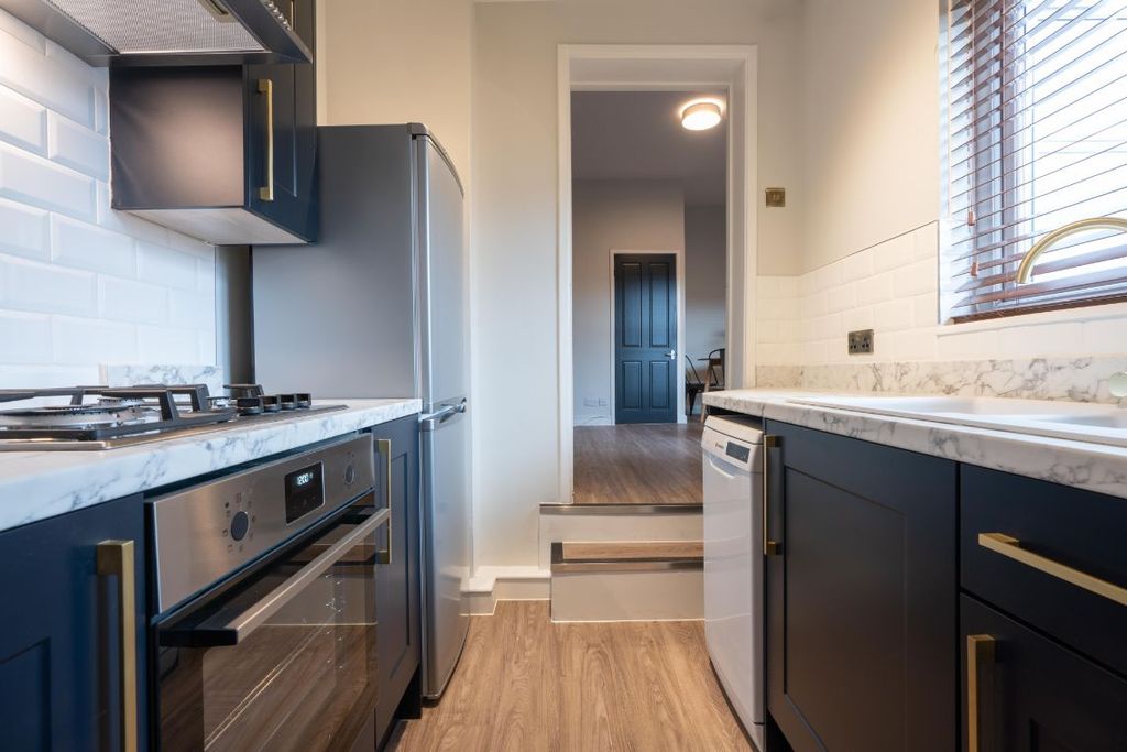 Property photo 2 of 8 120Dr - Kitchen