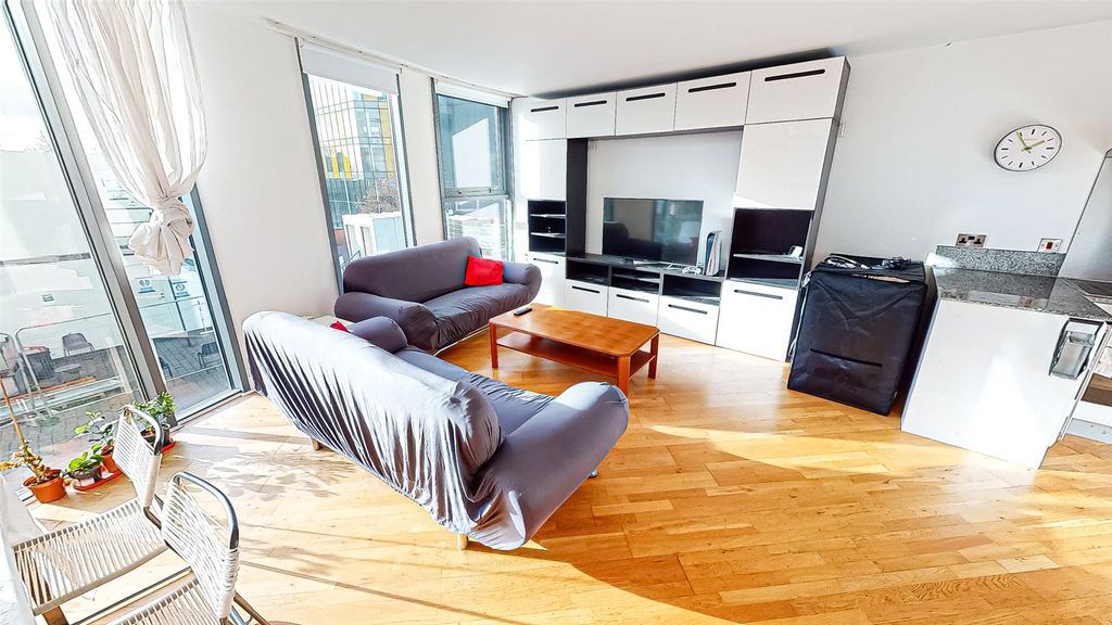 Property photo 1 of 8 Living Area