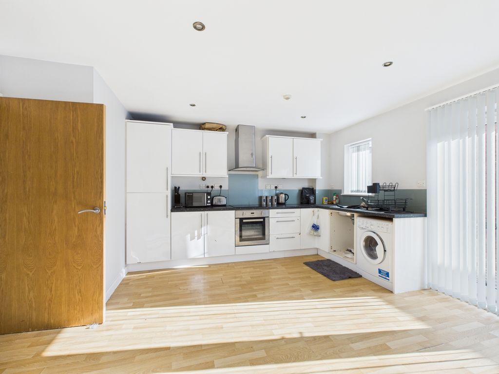 Property photo 3 of 11 Kitchen/Dining/Living