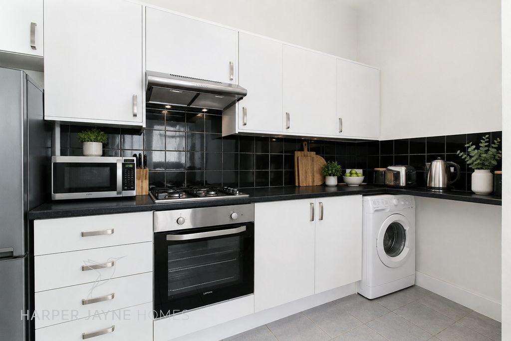 Property photo 2 of 5 Kitchen