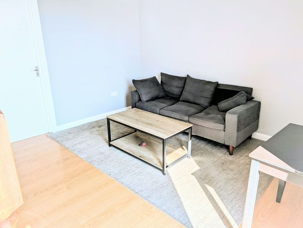Property photo 1 of 7 Living Area