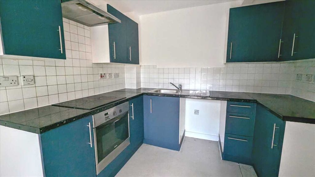 Property photo 3 of 7 Kitchen