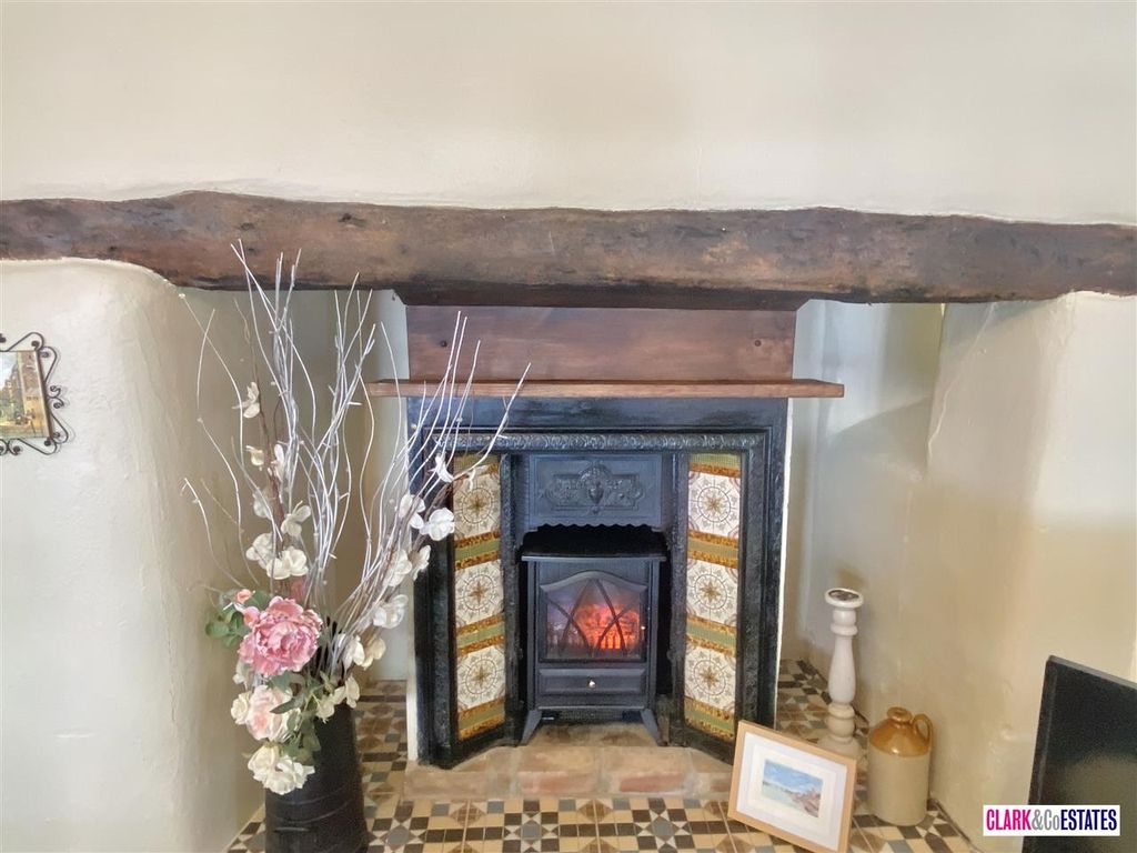 Property photo 2 of 12 Fireplace