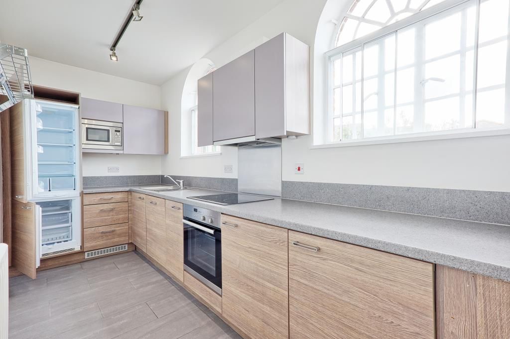 Property photo 3 of 10 Kitchen With Laminate Flooring With Bay Window And Cabinets
