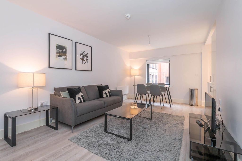 Property photo 2 of 8 Living Area / Dining Area