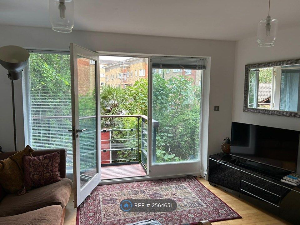 Property photo 2 of 17 Living Room - On A Dull Day