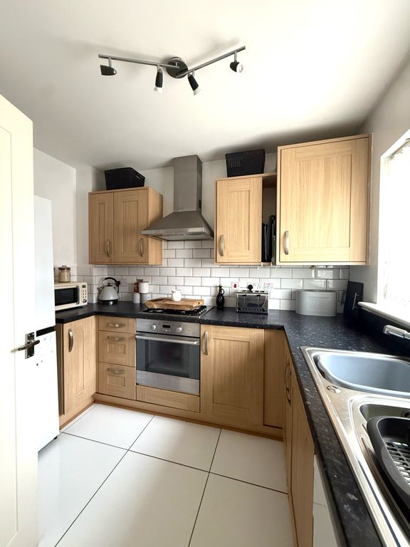 Property photo 2 of 12 Kitchen