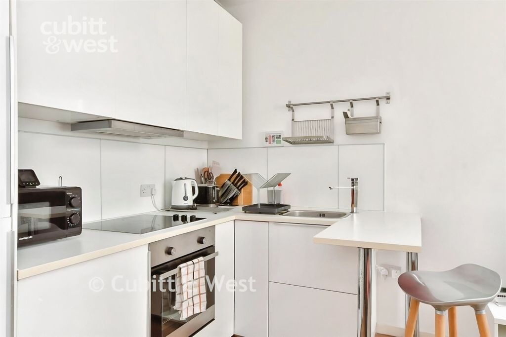 Property photo 3 of 12 Kitchen Area