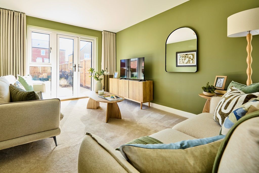 Property photo 3 of 23 The Living Room Is Spacious With Space For The Whole Family To Chill Out Together