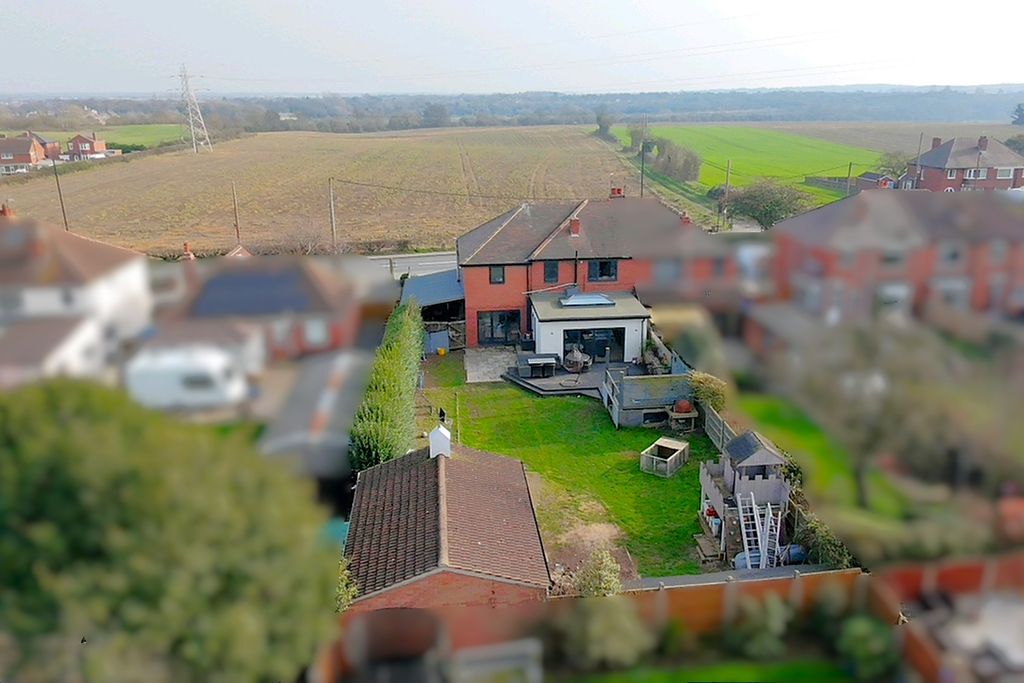 Property photo 2 of 34 Drone Rear