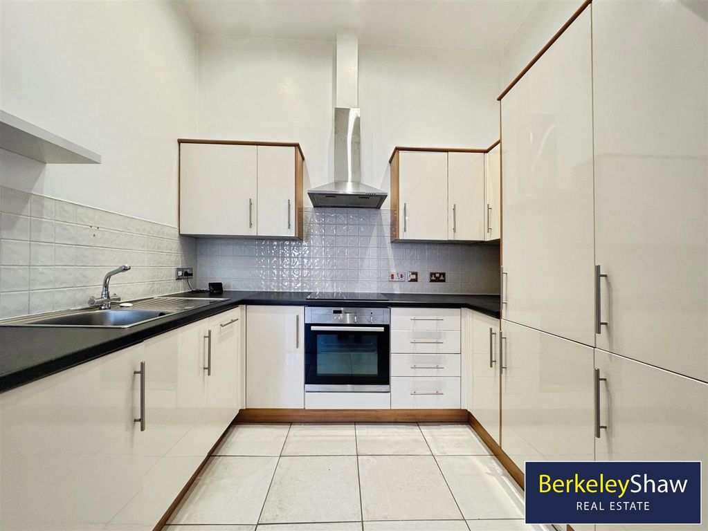 Property photo 3 of 13 Kitchen