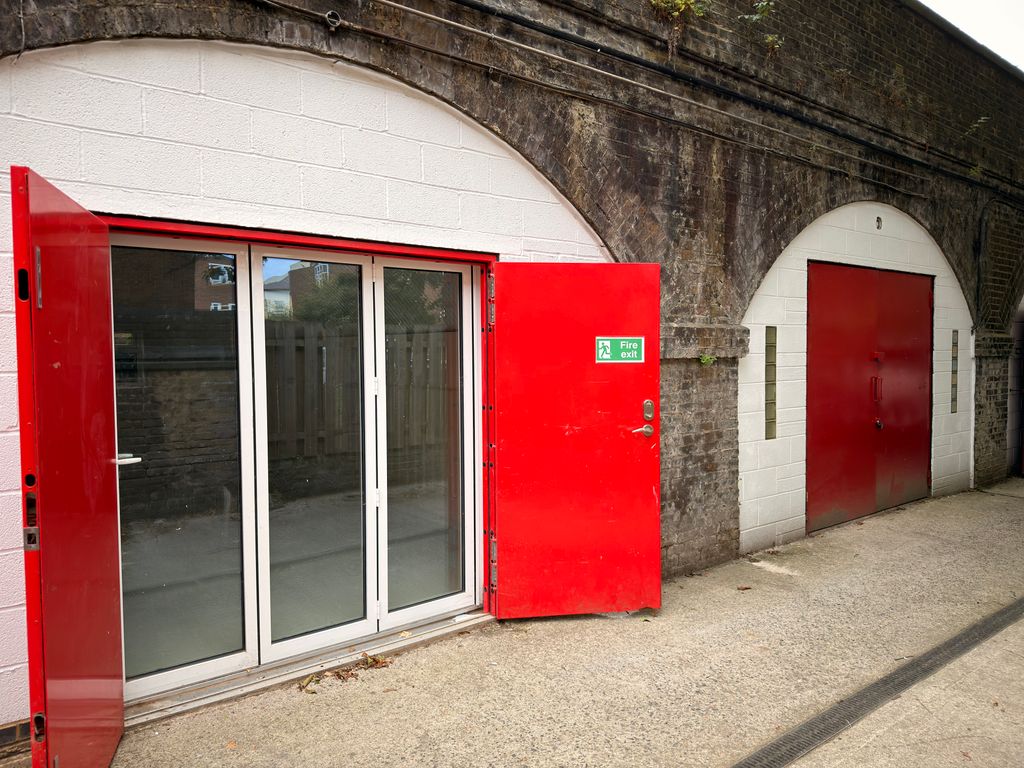 Property photo 1 of 5 The Front Of An Arch, With A Fully Glazed Frontage And Door Allowing You To See Into The Arch Interior.