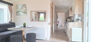 Property photo 2 of 6 Open Plan Dining Area And Hallway Inside The Willerby Rio Caravan