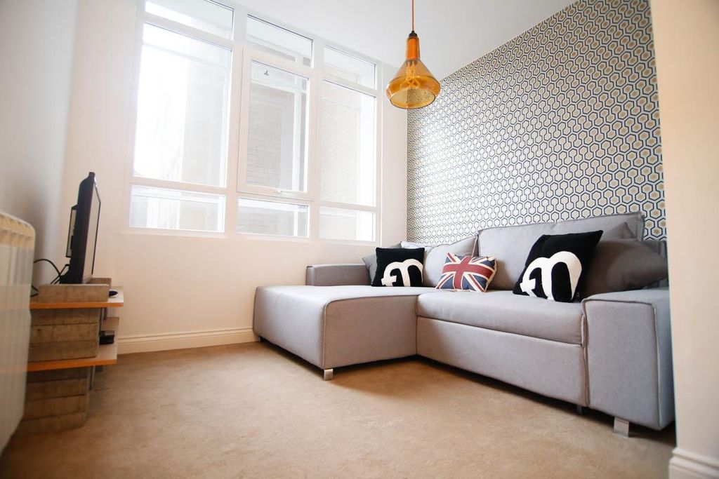 Property photo 1 of 7 Living Area