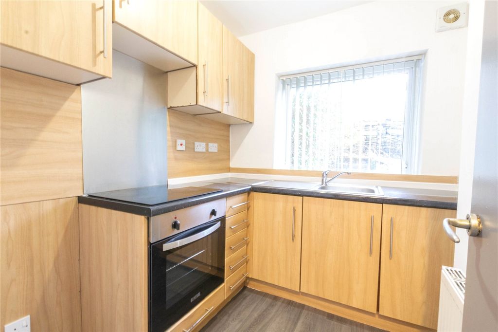 Property photo 3 of 16 Kitchen Area