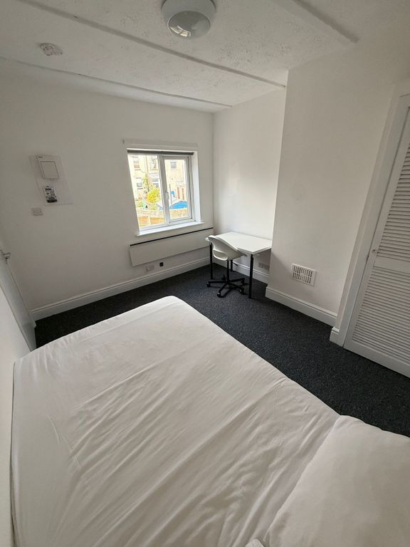 Property photo 2 of 17 This Inviting Double Bedroom Features Ample Natura...