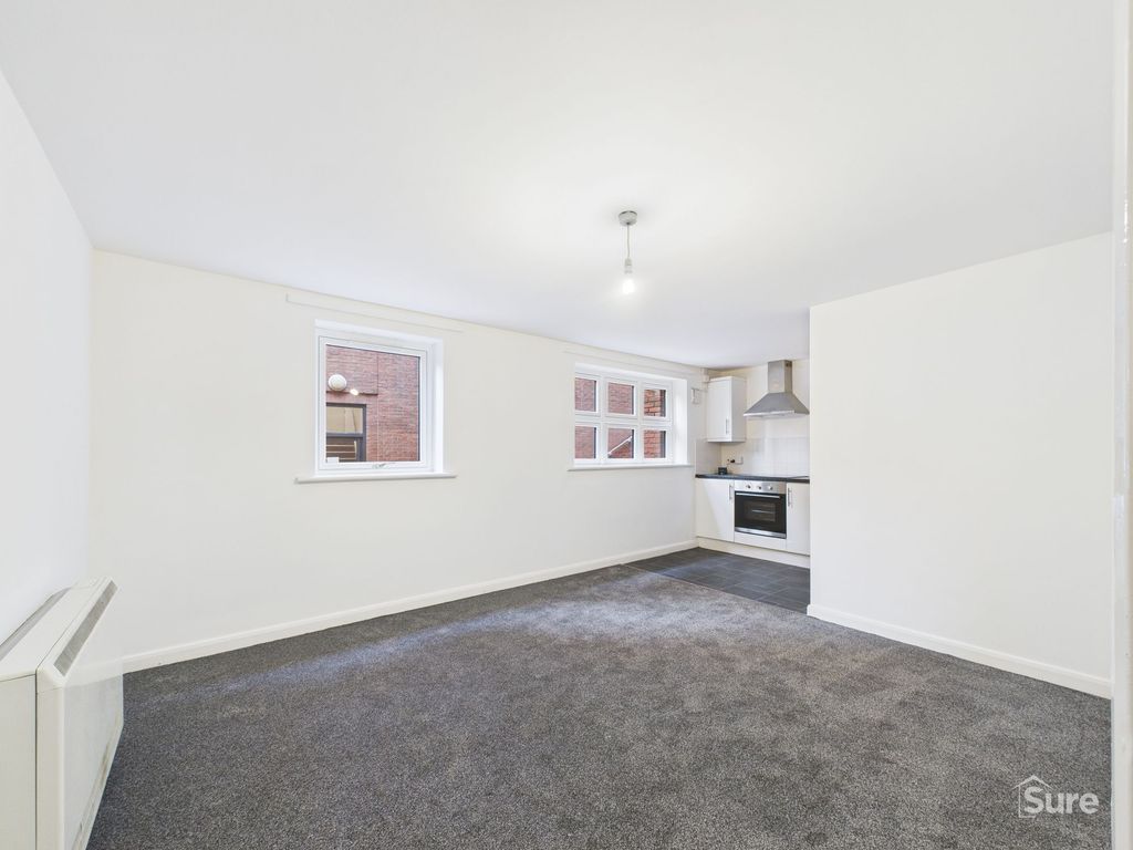 Property photo 2 of 11 Living Area And Kitchen