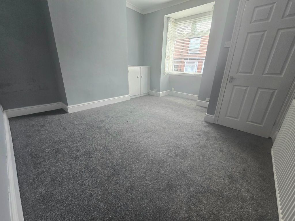 Property photo 2 of 8 Living