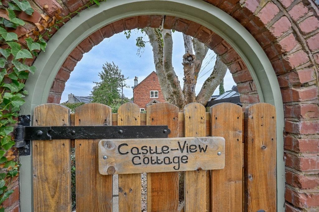 Property photo 3 of 21 Front