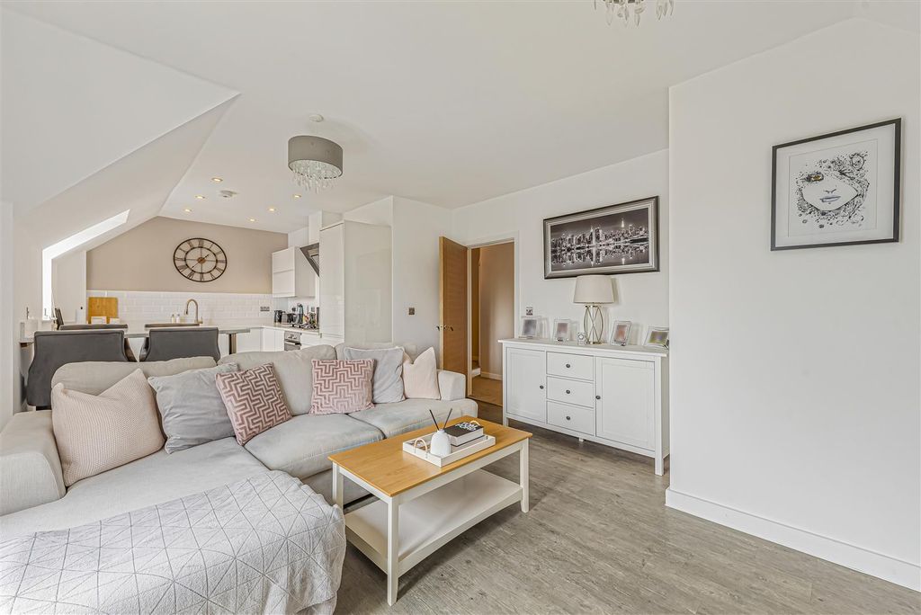 Property photo 2 of 11 Living Area