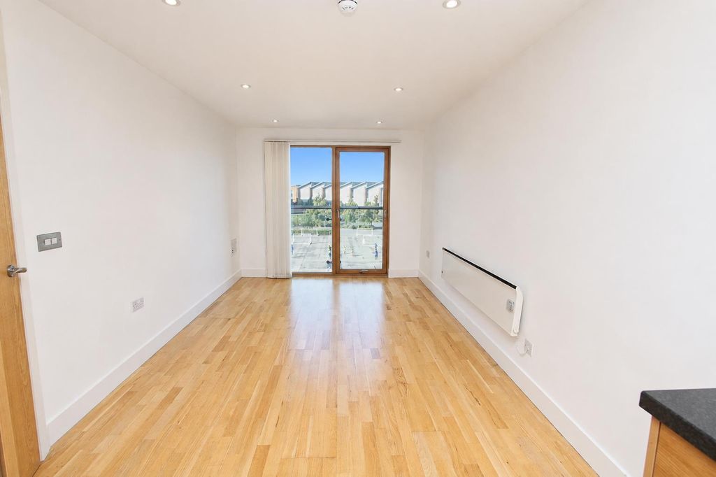 Property photo 2 of 6 Bright Living Room With Stylish Wooden Flooring...