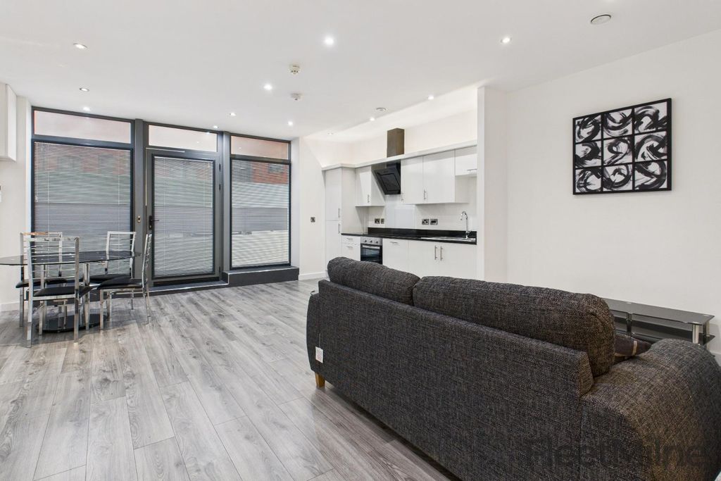 Property photo 2 of 13 Living Area