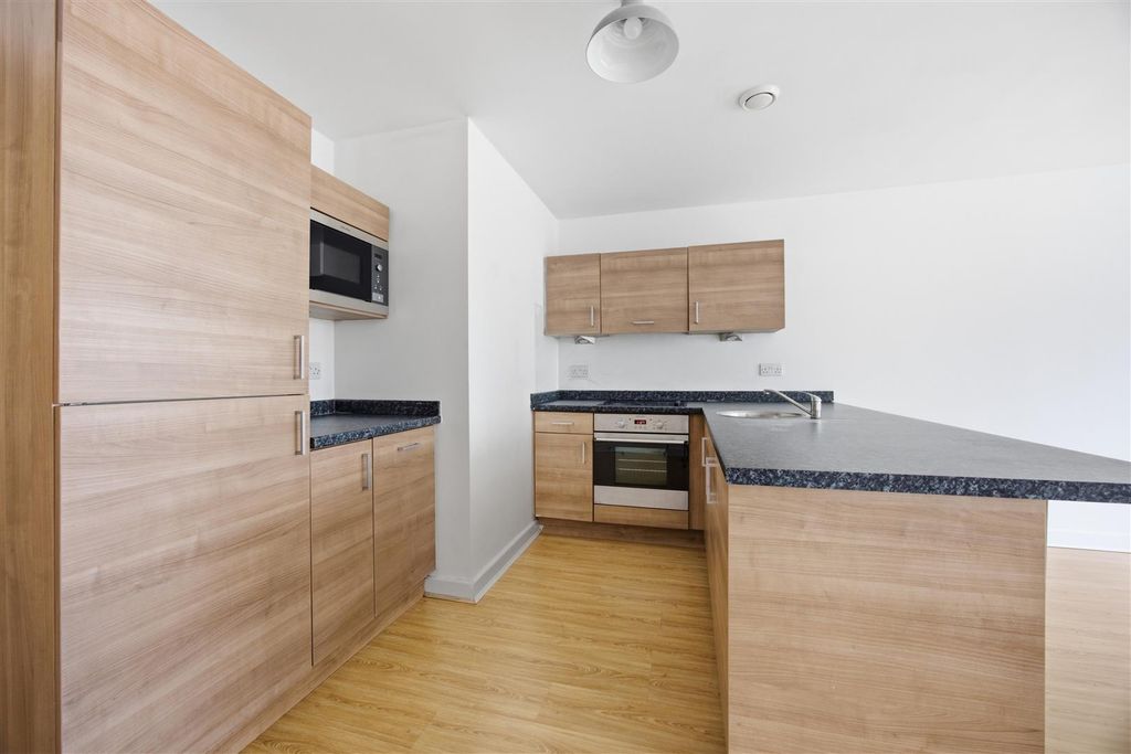 Property photo 3 of 13 Kitchen