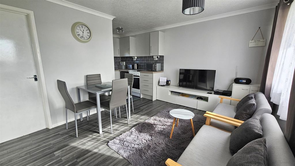 Property photo 3 of 8 Kitchen Living