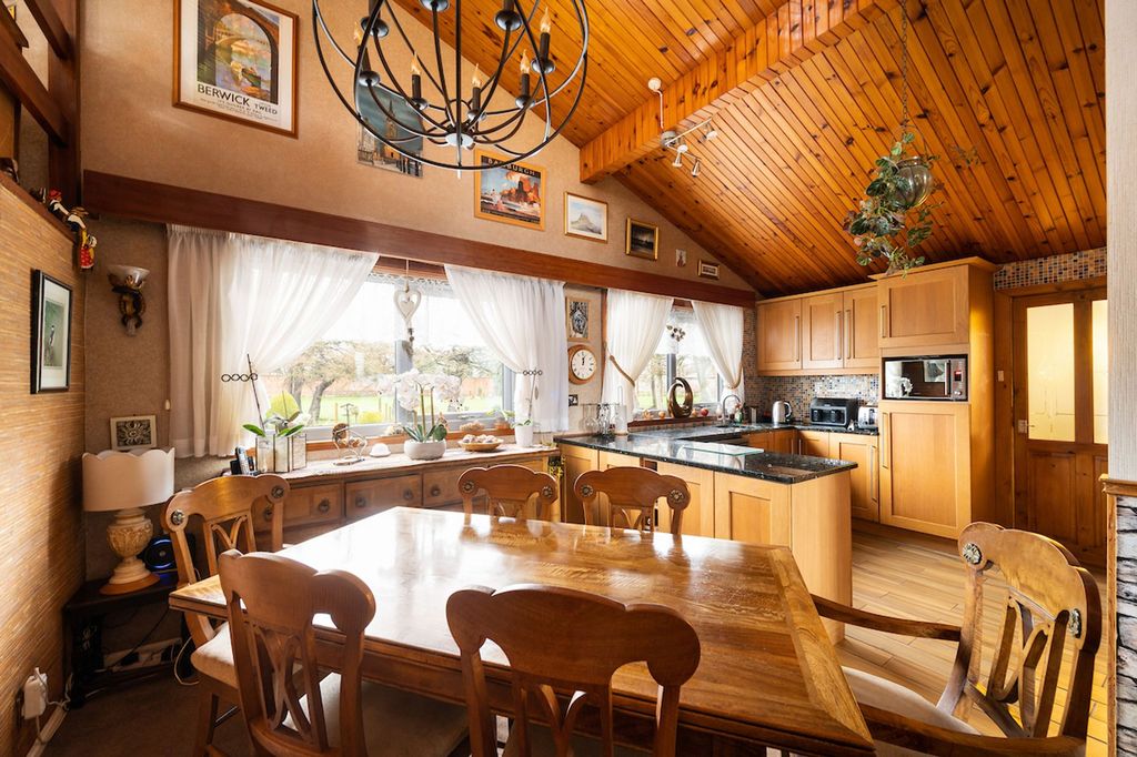 Property photo 3 of 42 Dining Kitchen