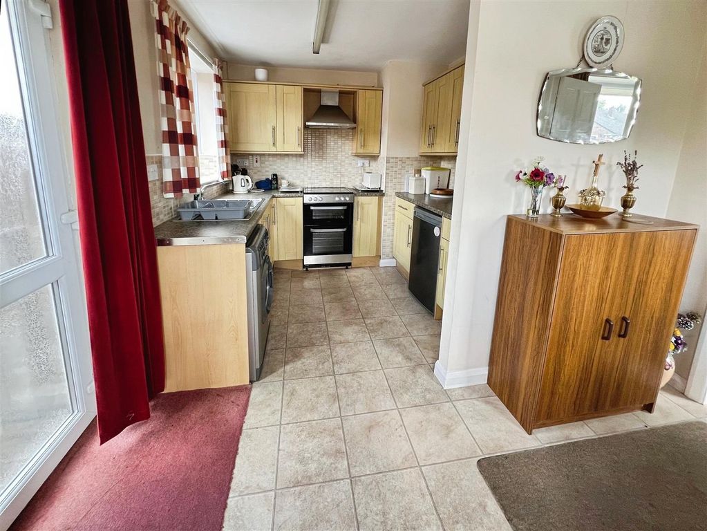 Property photo 2 of 13 Dining Kitchen