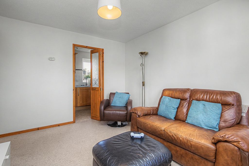 Property photo 3 of 12 Living Area - Angle 2