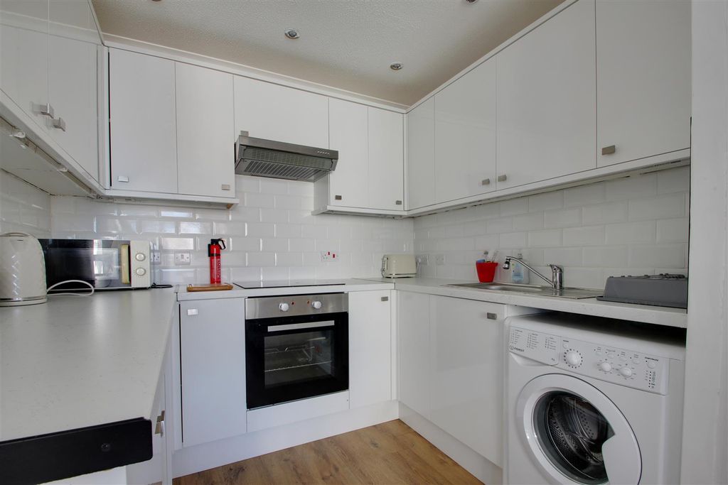 Property photo 2 of 12 Kitchen Area