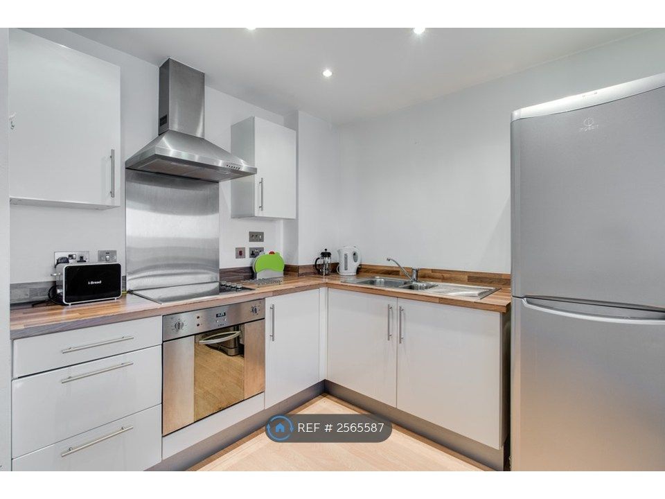 Property photo 2 of 12 Kitchen Area