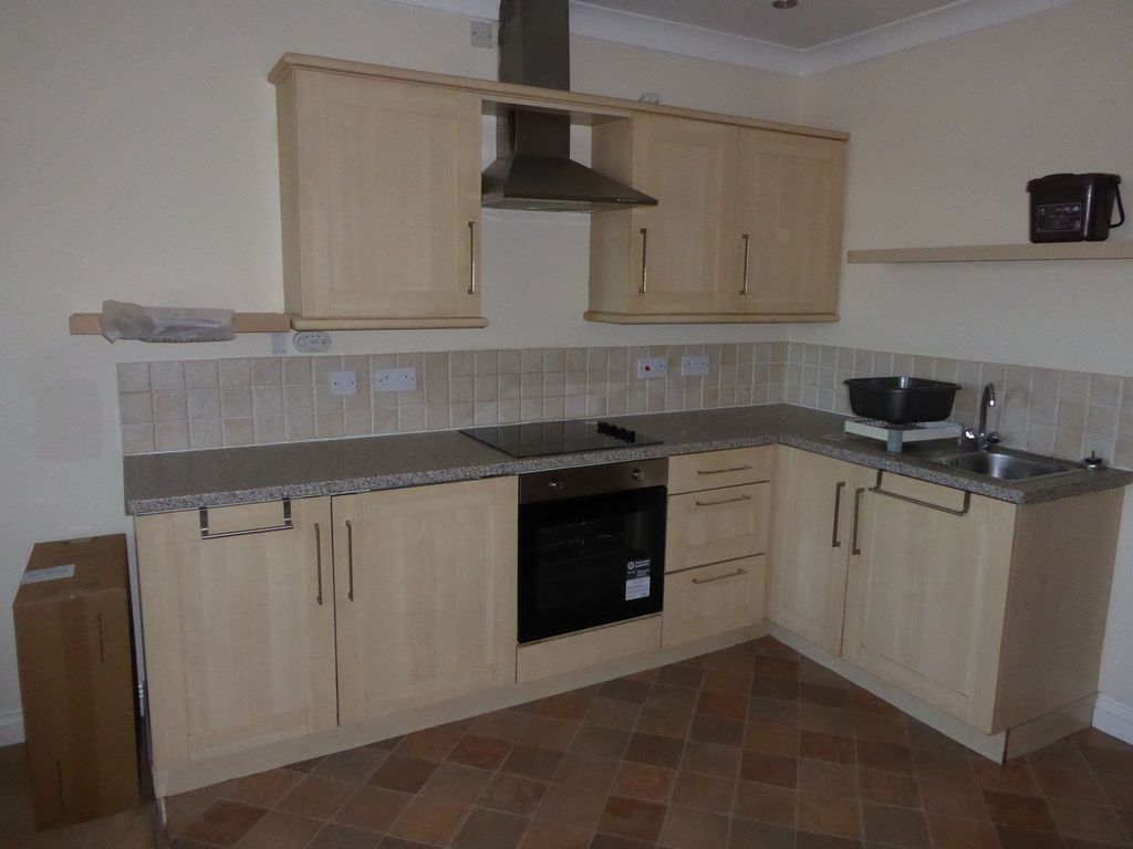 Property photo 3 of 9 Kitchen Area