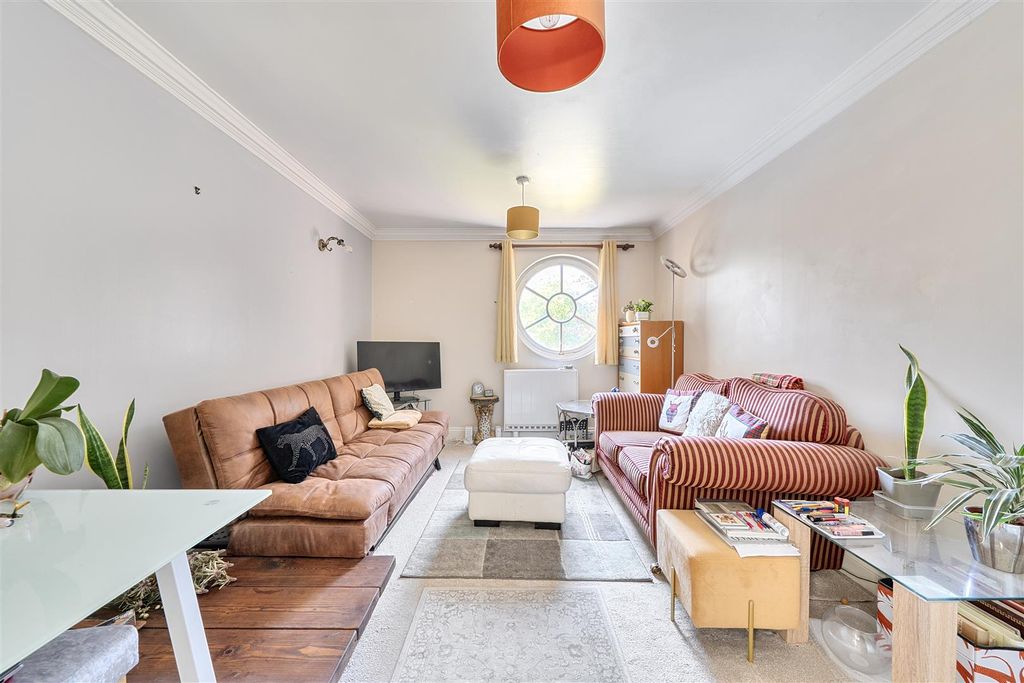 Property photo 2 of 18 Sitting Room  With Round Window.Jpg