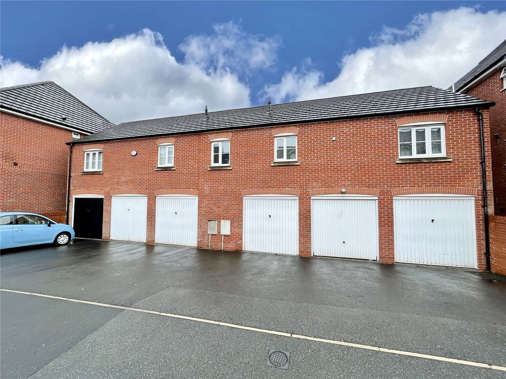 Property photo 2 of 12 Driveway & Garage