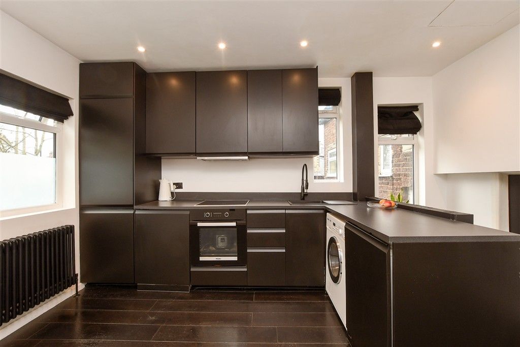 Property photo 1 of 12 Kitchen/Living Area