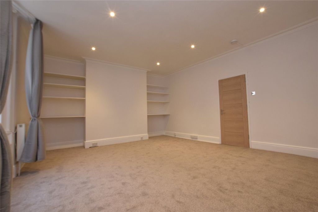 Property photo 3 of 8 Bedroom/Living Room