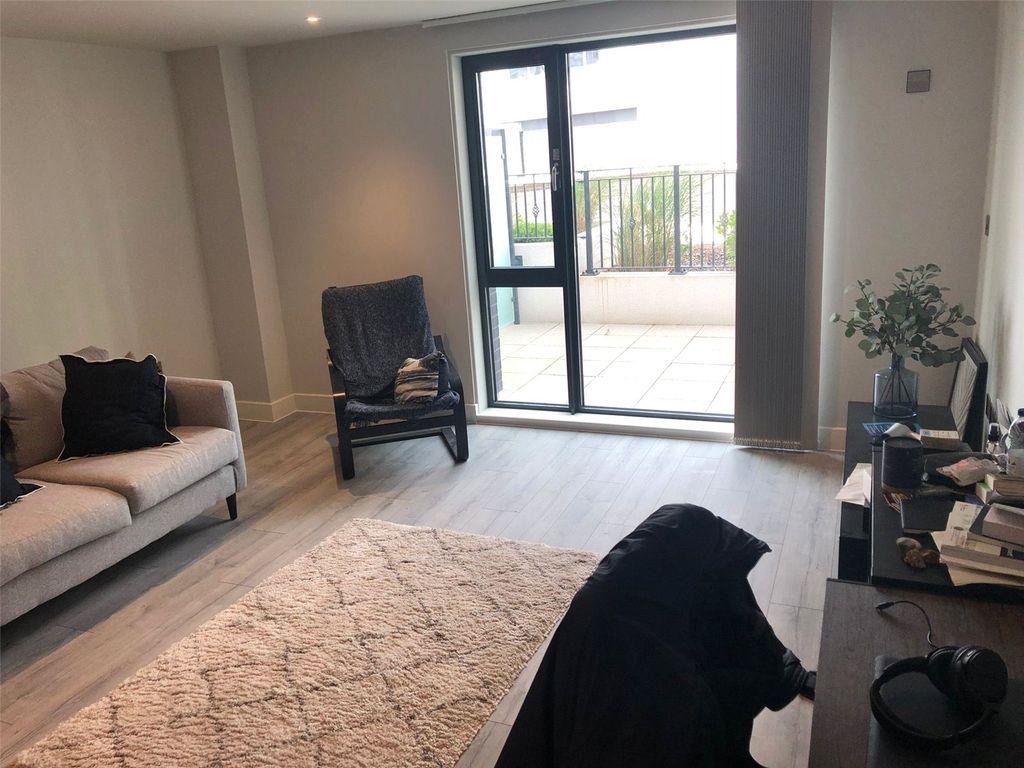 Property photo 1 of 11 Living Area