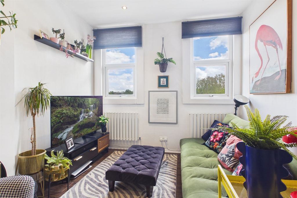 Property photo 3 of 11 Living Area