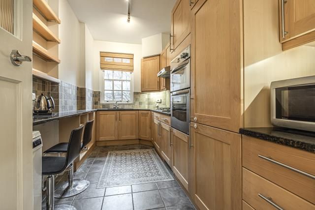Property photo 2 of 9 Kitchen